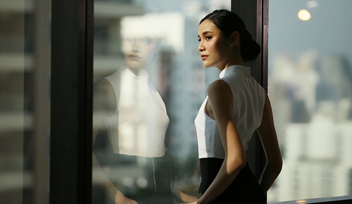 Woman looking out the window